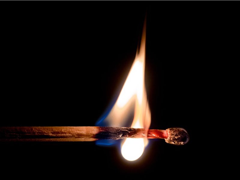 Burning matchstick