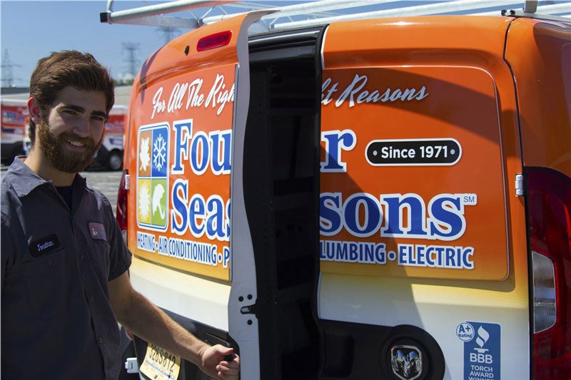 technician opening door to van