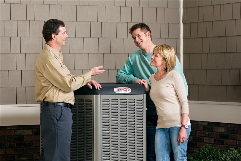 three people discussing