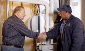 technician shaking hands with client