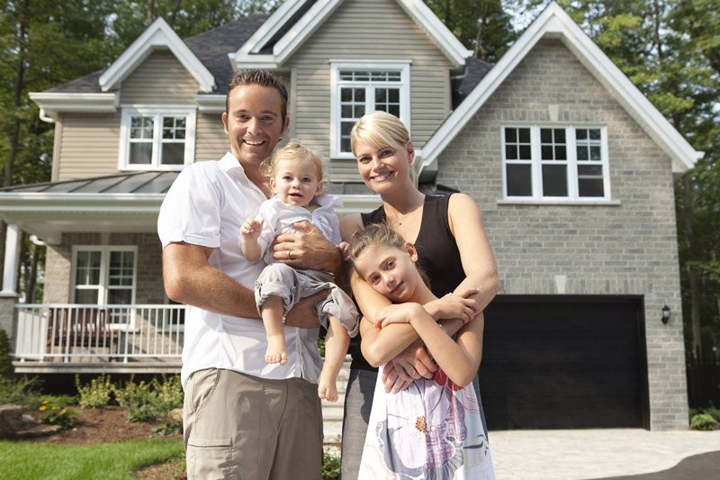 smiling family of four