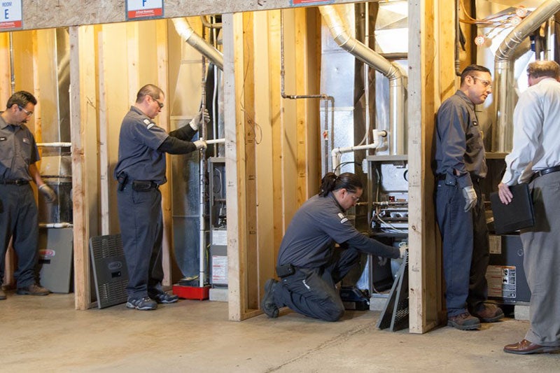 Four Seasons technicians in training room