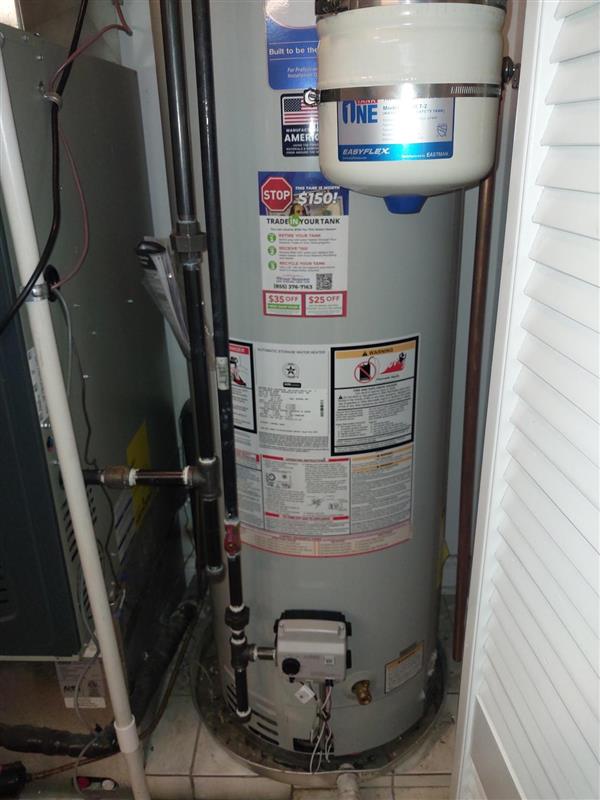 water heater repair chicago - plumber working on hot water heater